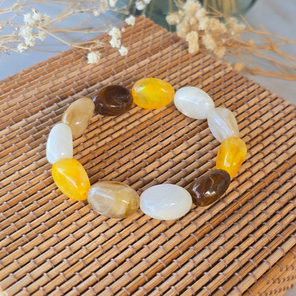 bracelet-orange-doux-perles-glossy-mira
