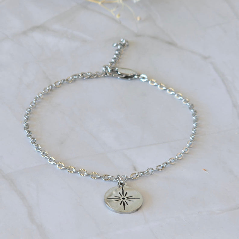 Bracelet STELLA en acier inoxydable argenté avec étoile ajourée