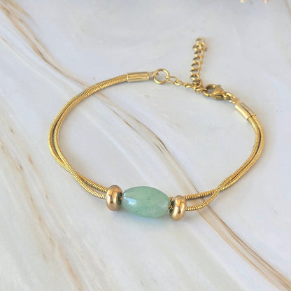 Bracelet AURA en acier inoxydable doré avec perle en aventurine
