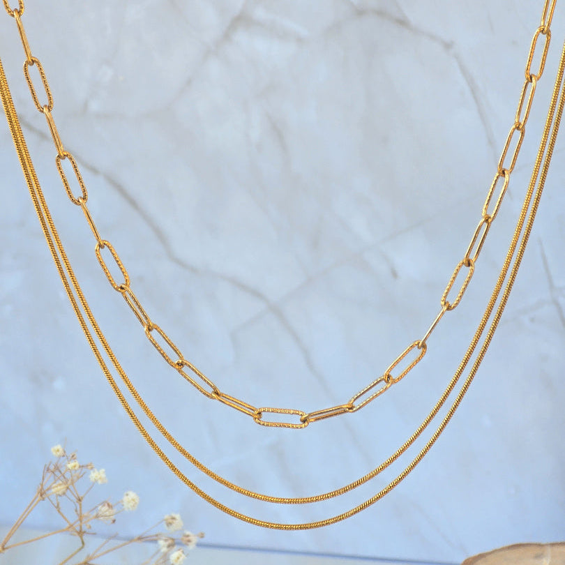 Collier Diana triple rang doré avec chaîne trombone et double chaîne serpent, bijou femme Annecy
