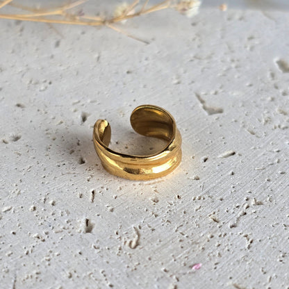 Earcuff en acier inoxydable avec lignes courbées