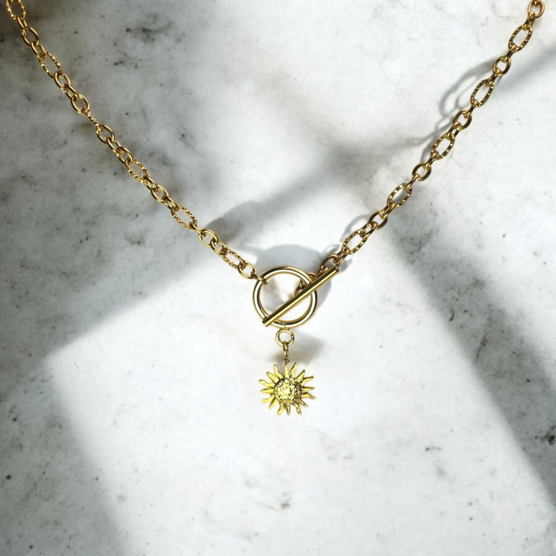 parure noel femme collier fermoir t et boucles soleil dorees zateka